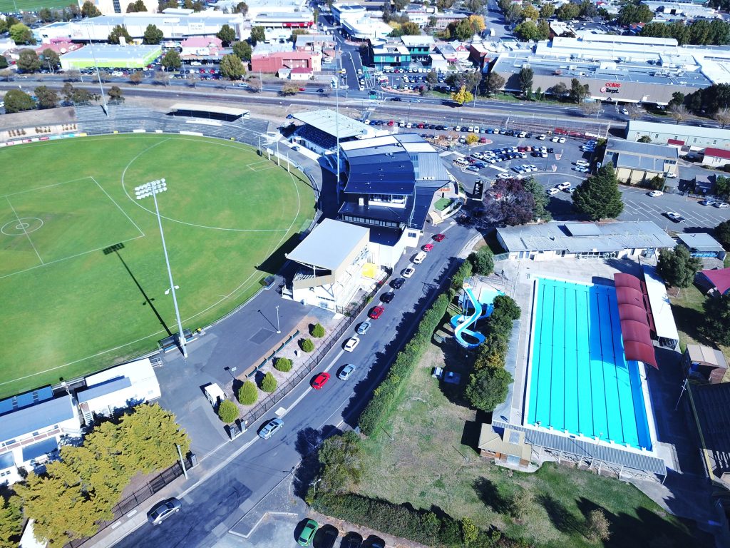 An image of the Glenorchy War Memorial Pool, KGV, the oval and surrounding roads. Image was taken from above.